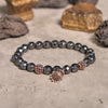 Evolvegem "HamsaIron Veil" Facted Hematite Hamsa Charm Bracelet
