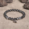 Evolvegem "HamsaIron Veil" Facted Hematite Hamsa Charm Bracelet
