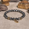 Evolvegem "HamsaIron Veil" Facted Hematite Hamsa Charm Bracelet