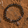Evolvegem "HamsaIron Veil" Facted Hematite Hamsa Charm Bracelet