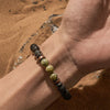 Evolvegem "Thalasso Syntax" Natural Serpentine Lava Stone Bracelet