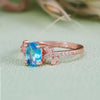 Evolvegem "Topziel Arbor" Oval Cut Blue Topaz Leaf Ring