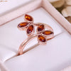 Evolvegem "Flammé Corolla" Garnet Leaf Ring