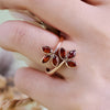 Evolvegem "Flammé Corolla" Garnet Leaf Ring