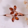 Evolvegem "Flammé Corolla" Garnet Leaf Ring