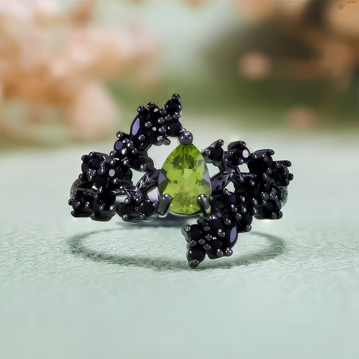 Evolvegem "Nyxian Symbiosis" Peridot Obsidian Ring